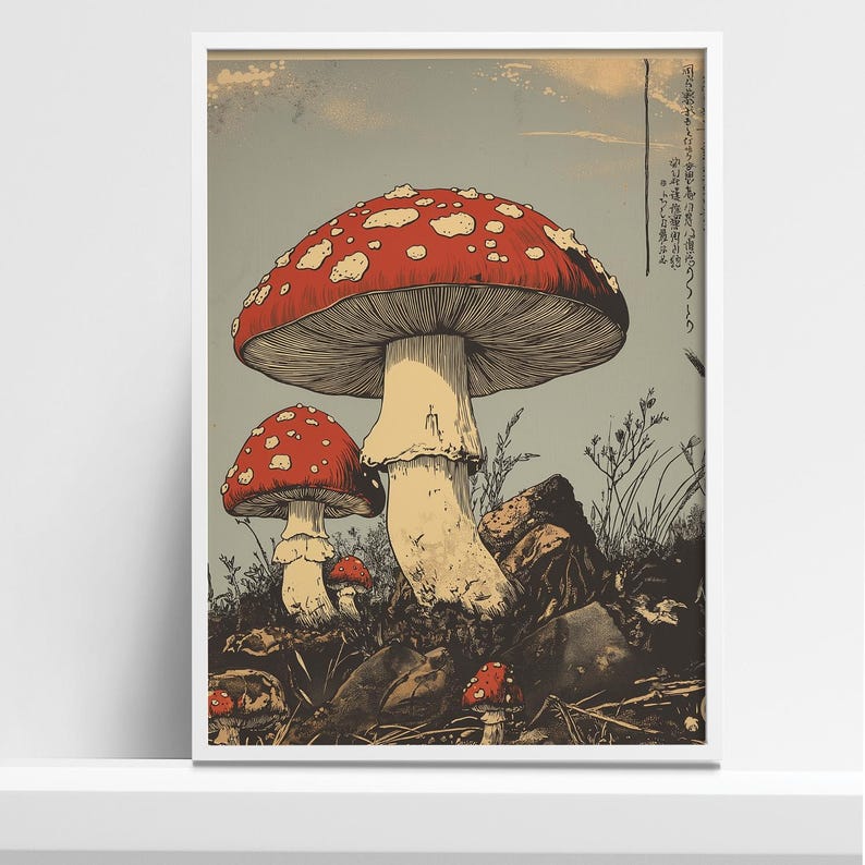Japanese woodcut-style art print of red Amanita mushrooms with vintage botanical detailing. Perfect for nature and mushroom art lovers.