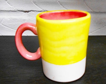 Ceramic Coffee Mug with Bright Yellow and Dark Pink glazes.