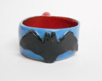 Mug Bat does Espresso Red and Blue Ceramic.