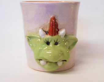 Mug, Ceramic Fungus the Bogeylady faced Cloudy Purple and Bright orange interior glazed Stoneware.