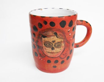 Mug Wheel thrown Stoneware Ceramic Red Day of the Dead faces.