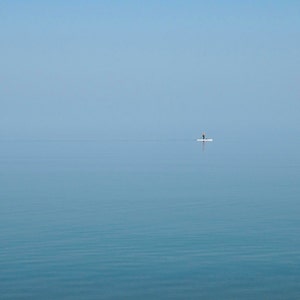 Tranquil Blue. Paddle Boarding. Lake Superior beach scape. Photograph. Blue water. Surfer. Minimal landscape. Archival Print