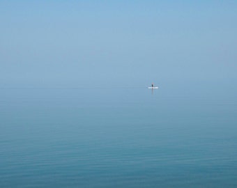 Tranquil Blue. Paddle Boarding. Lake Superior beach scape. Photograph. Blue water. Surfer. Minimal landscape. Archival Print