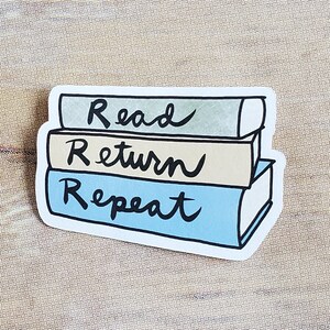 A cute sticker of a drawing of a stack of books with hand lettering showing the read return repeat cycle of library lending. art by AnneArchy