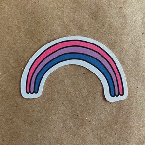 A cute sticker of a drawing of a rainbow with the colors of the bi pride flag. art by AnneArchy