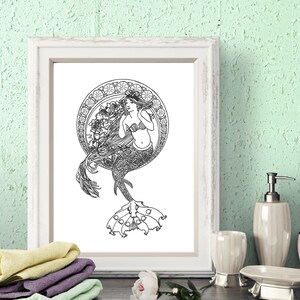 May include: Black and white line art print of a mermaid with long flowing hair, wearing a seashell bra and a tail with a decorative fin. The mermaid is surrounded by a circular frame with floral designs.