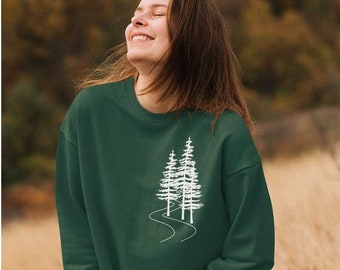 May include: A dark green sweatshirt with a white graphic of three trees and a winding path.
