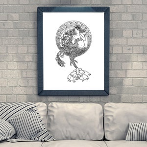 May include: Black and white line art print of a mermaid with long flowing hair, sitting within a circular frame of floral designs. The mermaid is wearing a seashell bra and has a fishtail.