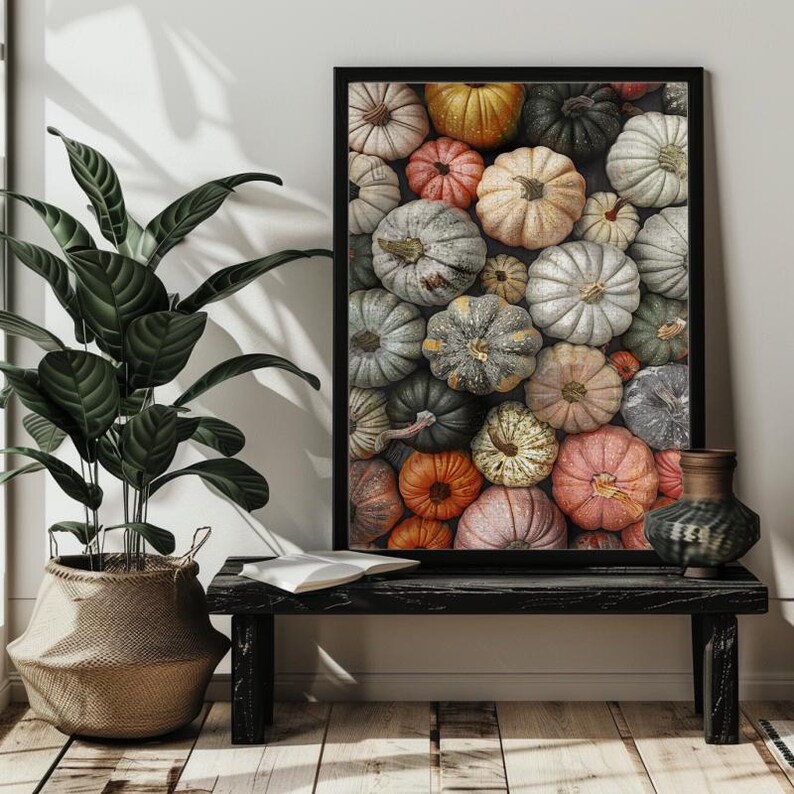 May include: A close-up image of a variety of pumpkins in different colors and sizes. The pumpkins are arranged in a random pattern, creating a visually appealing and textured display.