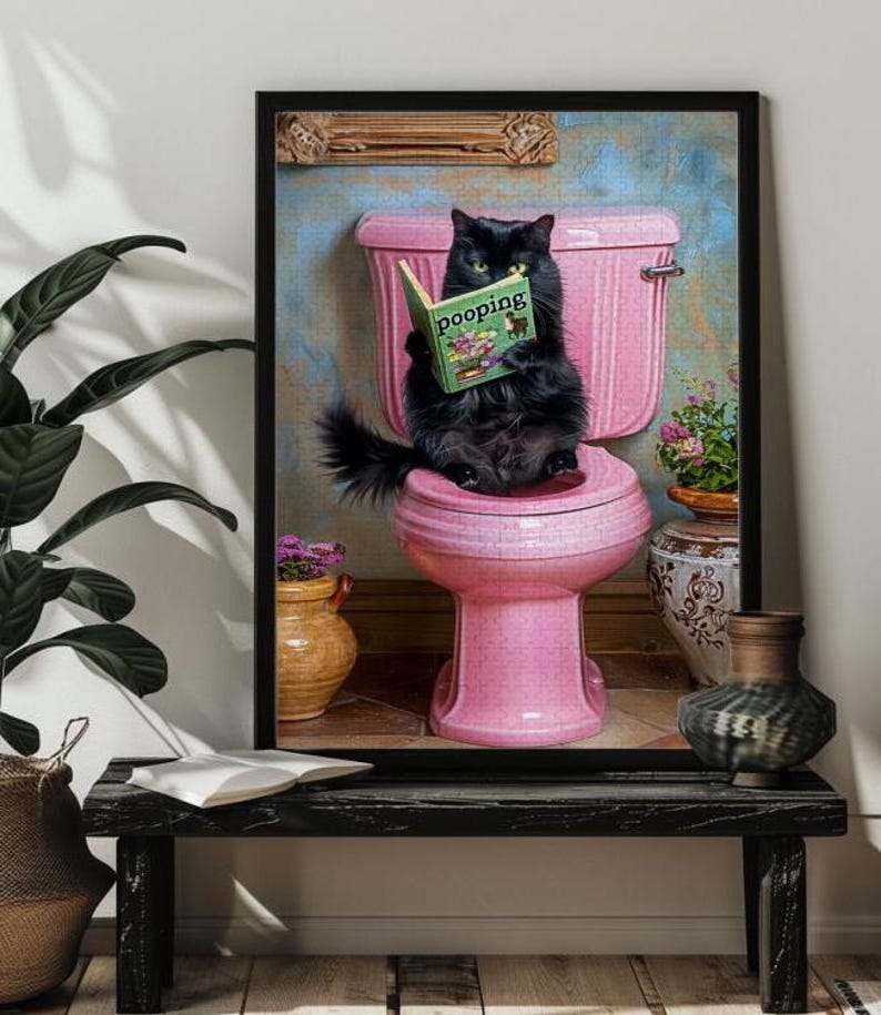May include: A black cat sitting on a pink toilet reading a book titled "Pooping". The cat is wearing a serious expression and is surrounded by plants.