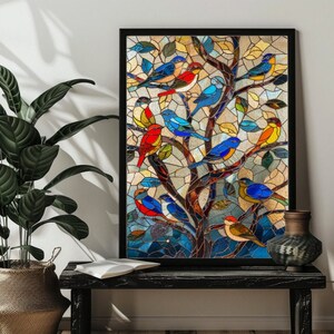 May include: A stained glass artwork depicting a tree with colorful birds. The birds are in various shades of blue, red, yellow, and green. The tree is made of mosaic glass pieces in shades of blue, green, and brown.