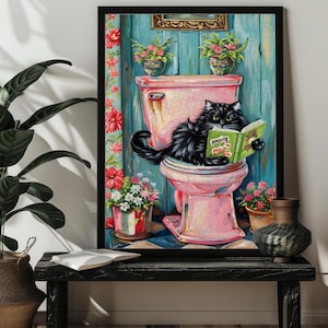 May include: A black cat sitting on a pink toilet with a book titled "Poo-ping" in its paws. The cat is in a bathroom with floral decorations and a blue wall.