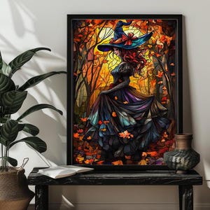 May include: A stained glass style illustration of a witch wearing a blue and red hat and a long blue and black dress. The witch is standing in a forest with fall leaves on the ground.