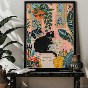 May include: A black cat sits on a white toilet reading a newspaper in a bathroom with pink walls and green plants. The newspaper has the word "Jell" printed on it.