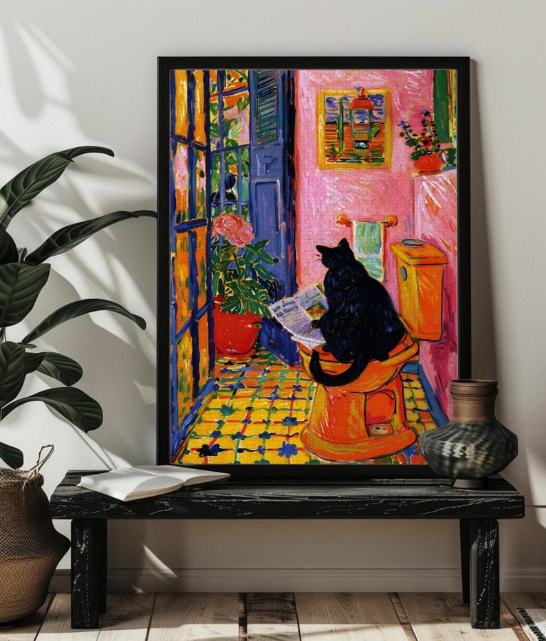May include: A black cat sits on a toilet seat in a bathroom with a pink wall, reading a newspaper. The bathroom has a yellow tiled floor and a window with a view of a garden.