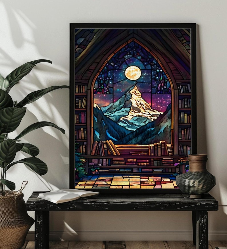 May include: A stained glass window depicting a mountain range with a full moon in the night sky. The window is framed by bookshelves filled with books. The scene is reminiscent of a library or study.