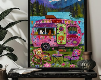 May include: A pink and green camper van with floral designs and two cats looking out the windows. The van is parked in front of a lake with mountains in the background. There are two chairs and a table with drinks on it in front of the van.