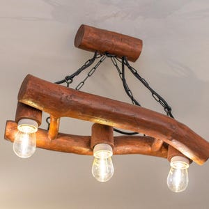 Wooden hanging lamp in a rustic style, natural.