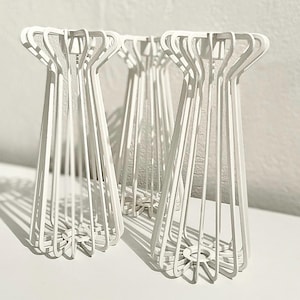 Three IKEA Trådig candlestick holders from the 1990s
