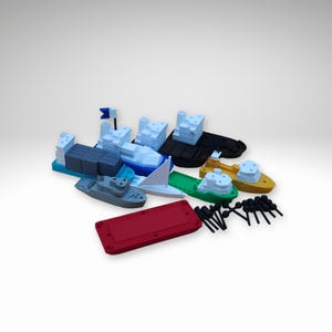 May include: A selection of colourful toy boats, including cargo ships, tugboats, and sailboats. The boats are in various colours, such as blue, green, yellow, and black. A red rectangular base and black accessories are also included.