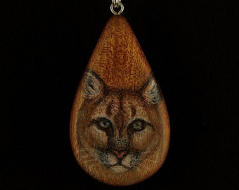 Cougar on Sappel Ribbon Wood Pendant