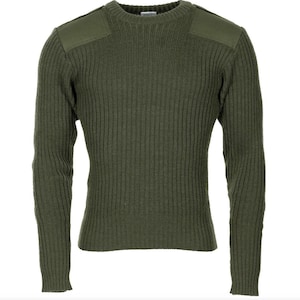 May include: An olive green long-sleeve sweater featuring a ribbed knit texture, a crew neckline, and solid fabric patches on both shoulders. The garment is constructed with a consistent vertical ribbed pattern throughout the body and sleeves.