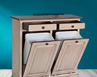 Furniture cabinet with two garbage cans and an extra large trash can that is handmade with trim