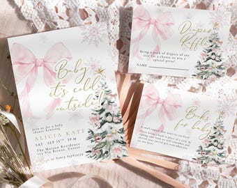 May include: Baby shower stationery set with a winter theme. The main invitation features a pink bow and the text "Baby it's cold outside." Additional cards include "Diaper Raffle" and "Books for baby" with Christmas tree illustrations.