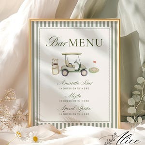 May include: A rectangular bar menu sign in a gold frame featuring a green and white striped border. The center displays a watercolor golf cart, a golf bag, and a putting green. Text includes Bar MENU, Amaretto Sour, Mojito, and Aperol Spritz.