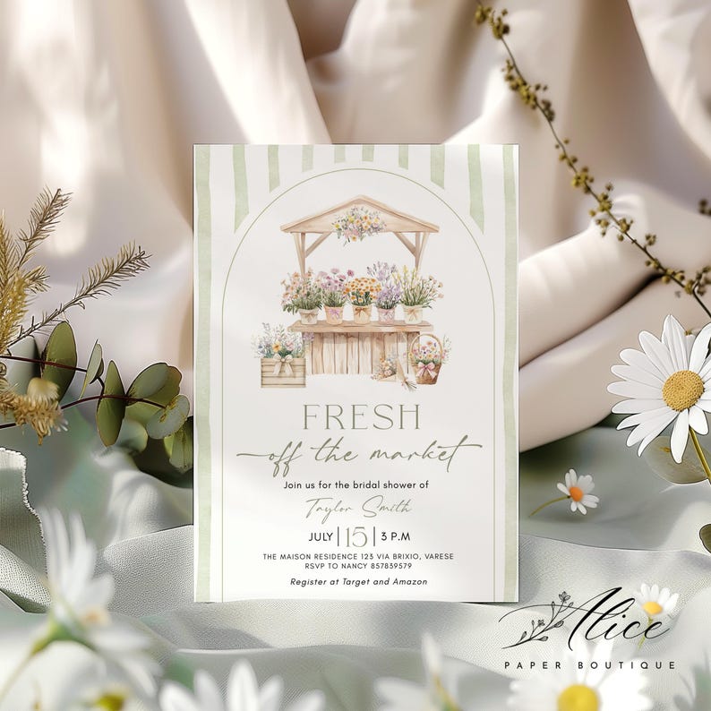 May include: A floral-themed invitation with a watercolor illustration of a flower stand. The text reads "FRESH off the market" and invites guests to a bridal shower. The date is July 15th at 3 P.M.