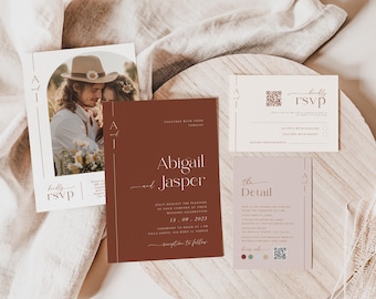 May include: A set of three wedding invitations with a rustic theme. The main invitation is a burgundy color with the names Abigail and Jasper in a modern font. The second invitation is a white card with a photo of the couple and the text "Kindly RSVP". The third invitation is a light pink card with the text "The Detail" and a QR code.