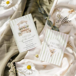 May include: Two invitation cards with a floral market theme. One card features a market stall illustration with flowers, the text "FRESH off the market", and event details. The other card has a striped background, a floral bouquet, and the text "FRESH off the market".