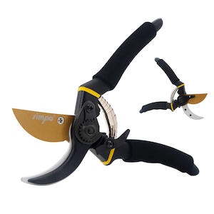May include: Black and gold pruning shears with a yellow accent and a spring-loaded mechanism. The shears have a black rubber grip and the blade is labelled "Simpo".