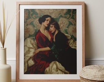 May include: A framed art print featuring two women in vintage attire, embracing. One woman wears a red dress, the other a black dress. The background has a floral pattern. The frame is light brown.