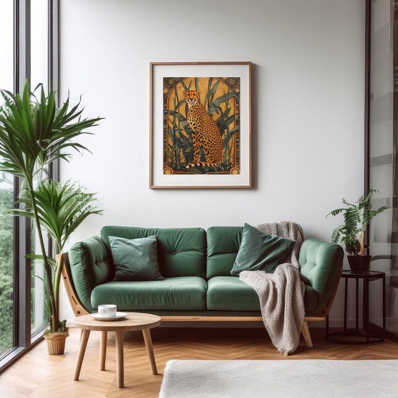 May include: A green velvet sofa with two pillows and a throw blanket. A framed print of a cheetah in a jungle setting hangs on the wall above the sofa.