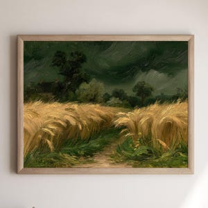 May include: A framed landscape painting featuring a golden wheat field under a dark, stormy green sky. A narrow dirt path winds through the center of the tall, textured stalks of grain, leading toward dark green trees and a small house in the distance.