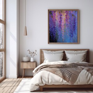 May include: A framed painting of wisteria blossoms in shades of purple, pink, and yellow hangs above a wooden bed. The artwork is the focal point of a bedroom with a neutral colour palette, including a wooden bedside table and a white bedspread.