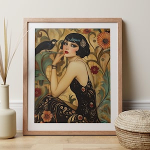 May include: A framed art print featuring a woman with dark hair and a black dress, sitting in a garden setting with a bird perched on a branch. The background is a vibrant mix of gold, green, and red.