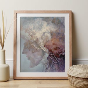 May include: Framed artwork featuring a profile silhouette integrated with a tree and cloudscape. The painting uses a muted color palette of purples, browns, and blues. The artwork is displayed in a light brown wooden frame.