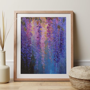 May include: A framed oil painting depicting wisteria flowers in purple, pink, and blue hues. The artwork uses a textured, impressionistic technique to portray long, hanging flower clusters. The wooden frame provides a natural element to the floral art.