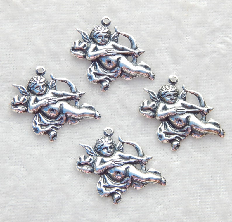 Destash Set of 4 Cupid charms Antiqued Silver plated brass stamping image 1