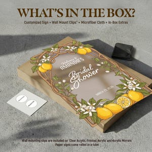 May include: A box with a custom sign for a bridal shower, decorated with lemons and flowers. The sign reads "Welcome to Amanda's Bridal Shower" with the date March 25, 2026. Includes wall mount clips and a microfiber cloth.
