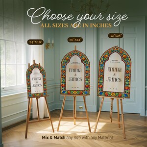 May include: Three arched wedding signs on wooden easels, featuring a stained glass border in orange, blue, and green. The signs display the text 'WELCOME TO OUR WEDDING', 'EMMA & JAMES', and a date. Sizes shown are 24x16 inches, 36x24 inches, and 42x28 inches.