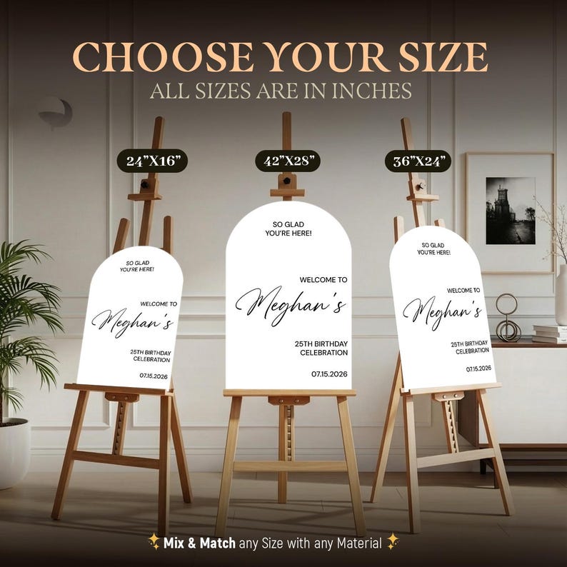 May include: Three white arched welcome signs on wooden easels, each displaying the text: SO GLAD YOU'RE HERE! WELCOME TO Meghan's 25TH BIRTHDAY CELEBRATION 07.15.2026. The signs are labeled with sizes 24"x16", 42"x28", and 36"x24" in inches.