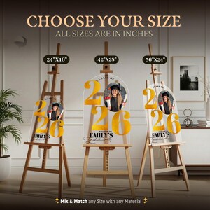 May include: Three graduation party signs on wooden easels. The signs are clear acrylic with gold lettering and a photo of a graduate. The signs are labeled with the text "Class of 2026" and "Welcome to Emily's Graduation Party". The sizes are 24"x16", 42"x28", and 36"x24".