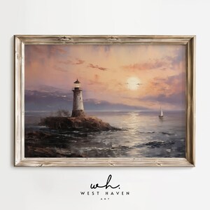 Peut inclure: Peinture de paysage encadrée d'un phare sur une île rocheuse au coucher du soleil. L'œuvre présente un phare blanc, un voilier et une palette de couleurs chaudes avec des tons orange, rose et violet. La peinture est signée "wh." et le texte "WEST HAVEN ART" est visible.