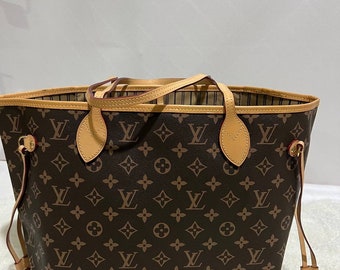 Monogramme LV Neverfull MM vintage avec sac de rangement