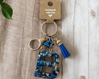 Resin initial keyring.
