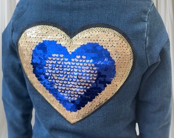 Girls personalise denim jacket with heart sequin motif