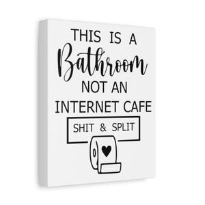 May include: Black and white sign with the text "This is a Bathroom not an Internet Cafe Shit & Split" and a black and white illustration of a toilet paper roll with a heart on it.